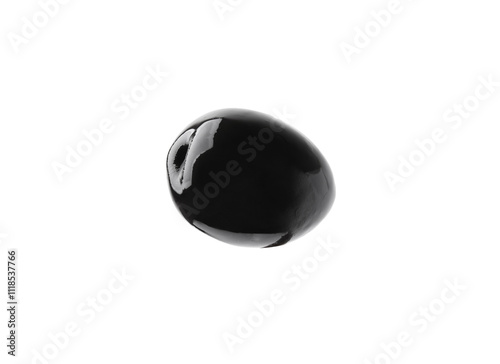 One whole black olive isolated on white