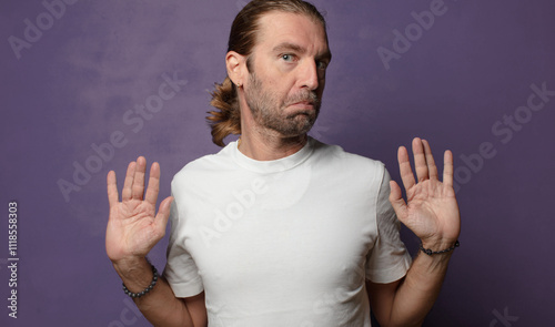 laughing and slapping forehead like saying d’oh! I forgot or that was a stupid mistake