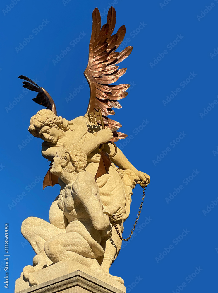 Obraz premium The Archangel Michael holding the devil at bay