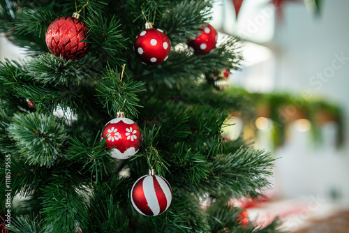 Obraz na płótnie Merry x-mas,Close up of Colorful balls ,gifts box and Christmas greeting picture parcel,bell decoration on Green Christmas tree background Decoration During Christmas and New Year. w salonie