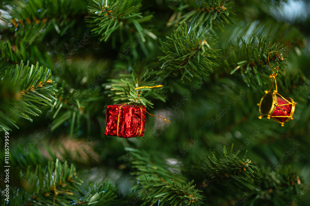 Merry x-mas,Close up of Colorful balls ,gifts box and Christmas greeting picture parcel,bell decoration on Green Christmas tree background Decoration During Christmas and New Year.