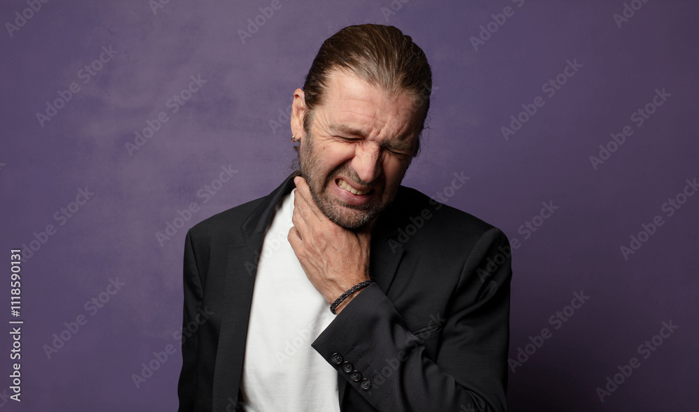 feeling ill with a sore throat and flu symptoms, coughing with mouth covered feeling ill with a sore throat and flu symptoms, coughing with mouth covered