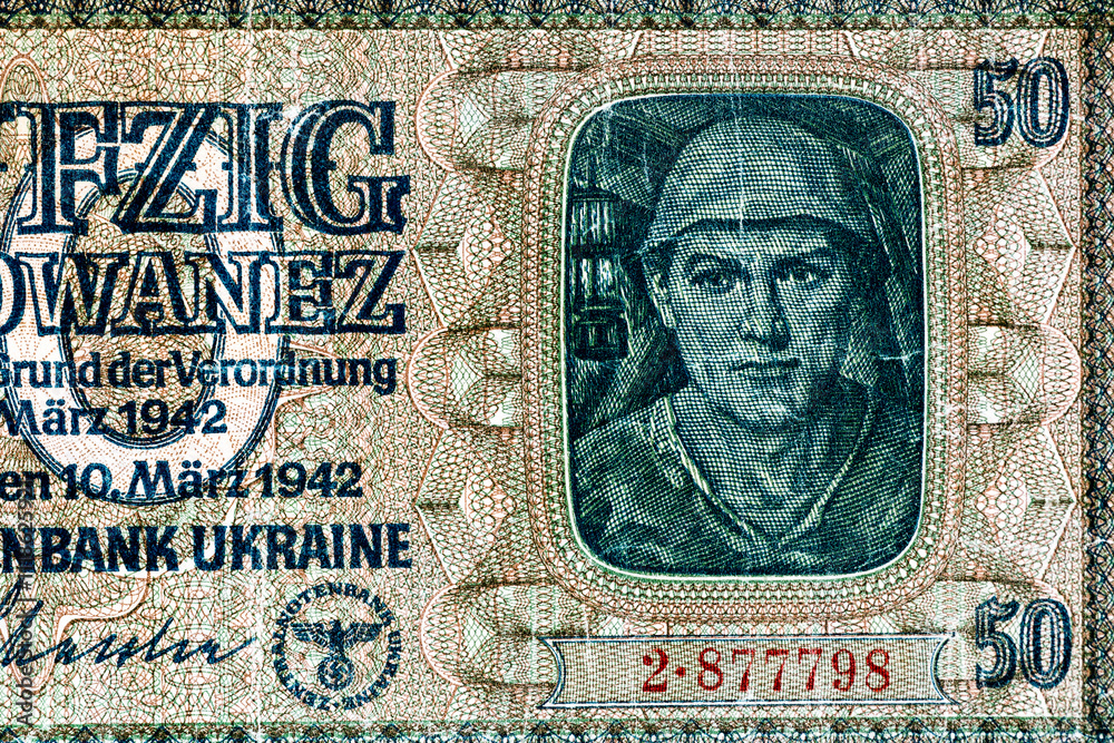 Obraz premium Vintage elements of old paper banknotes.Old 50 karbovanez bill of Ukraine. Occupying the money of the German Reich in 1942,Rovno
