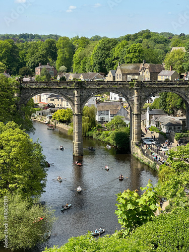 Knaresborough viaduct and town centre over River Nidd with lush green valley, North Yorkshire UK