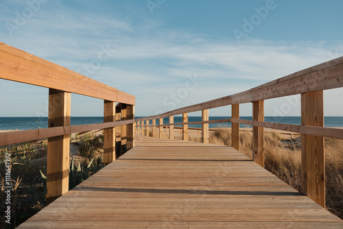 Wooden bridge leading to a beach