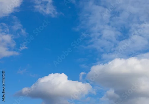 Obraz Błękitne niebo z chmurami. Blue sky with clouds.	