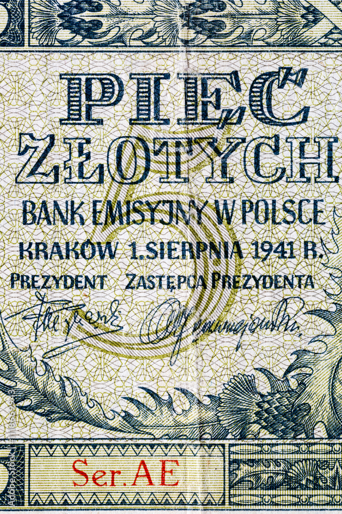 Obraz premium Vintage elements of old paper banknotes.Bonistics.Polish banknotes-5 polish zloty 1941.Fragment banknote for design purpose.