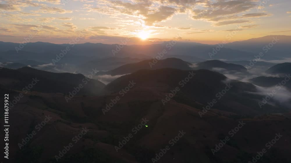 Aerial view of morning mist over the mountains in Mae Chaem District, Chiang Mai Province, Thailand Aerial view of morning mist over the mountains in Mae Chaem District, Chiang Mai Province, Thailand
