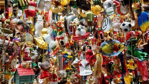 Christmas glass decorations for sale on a shop window, decorative hand painted ornament for the christmas tree. 4K