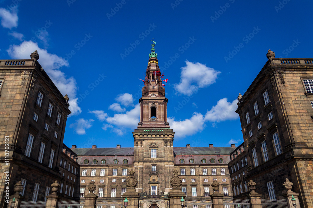 Fototapeta premium Christiansborg palace, seat of Danish Parliament, Prime Minister and Supreme Court of Denmark, Copenhagen, sunny summer day