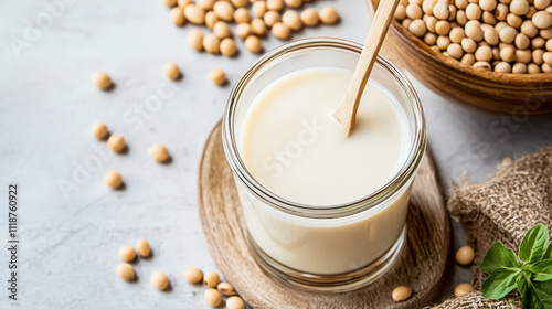 Celebrating World Plant Milk Day with creamy soy milk and wholesome soybeans in a cozy kitchen setting