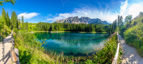 Fototapeta Naklejka Na Ścianę i Meble -  Karersee, dolomites, stunning panoramic view of lake and latemar mountain range in summer