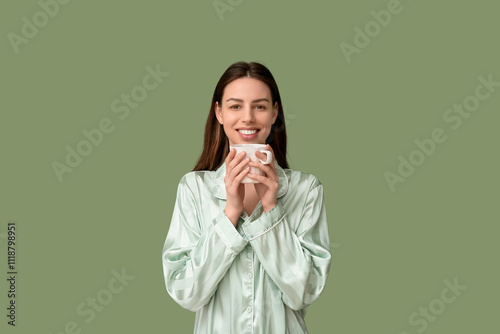 Young woman in pajamas havi...