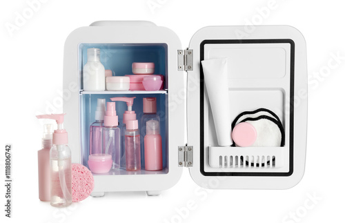 Small cosmetic refrigerator with cosmetic products on white background