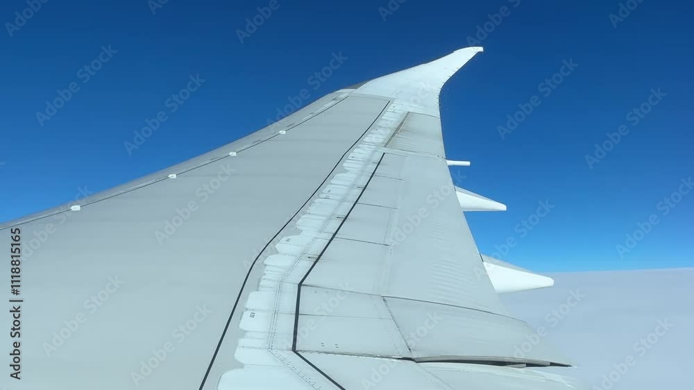 AERIAL VIEWS FROM INSIDE AN AIRPLANE TO THE EXTERIOR AERIAL VIEWS FROM INSIDE AN AIRPLANE TO THE EXTERIOR