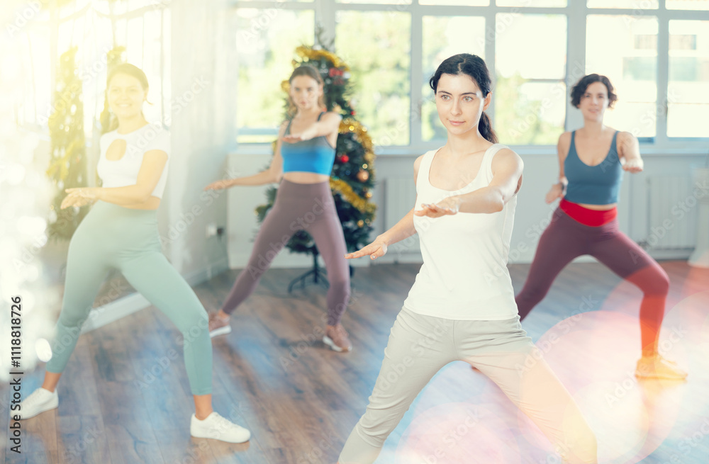 Group of women dancing energetic modern dance in studio Group of women dancing energetic modern dance in studio