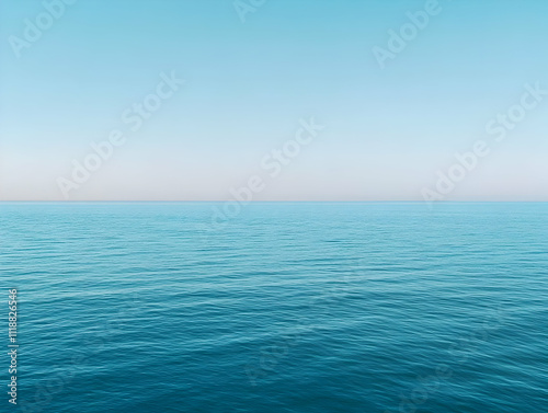 Wallpaper Mural A serene view of calm ocean waters under a clear blue sky. Torontodigital.ca