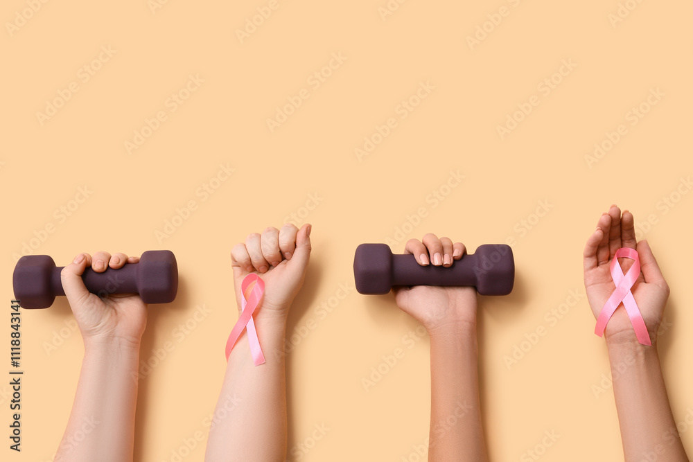 Female hands with dumbbells and pink ribbons on color background, closeup. Breast cancer awareness concept Female hands with dumbbells and pink ribbons on color background, closeup. Breast cancer awareness concept