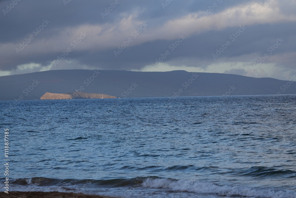 Molokini atoll in morning light from Maui Molokini atoll in morning light from Maui