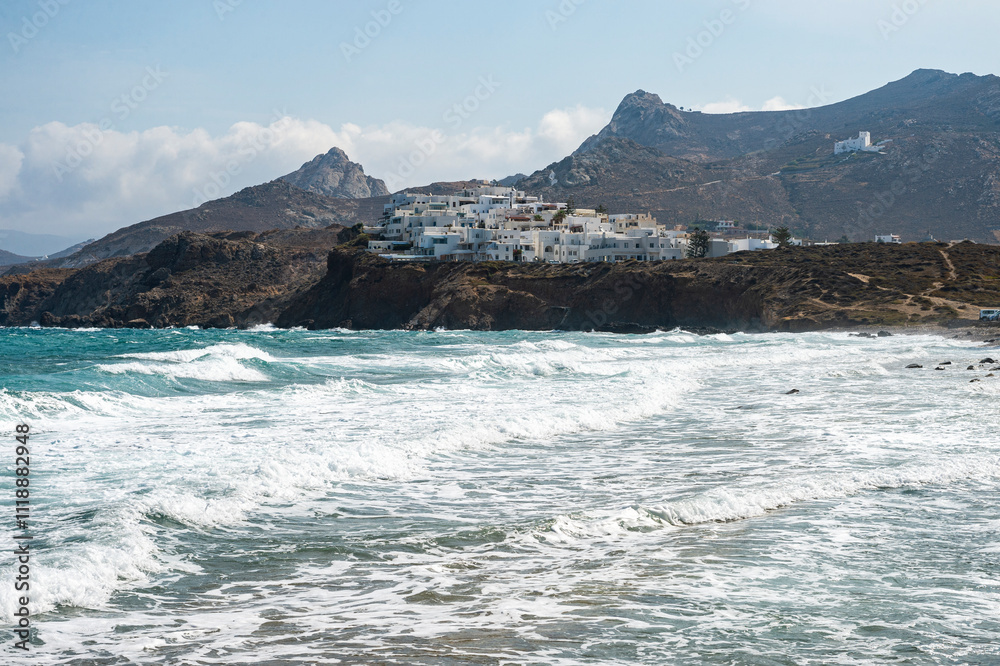 View from Naxos town looking north along the wave battered coast of the island of Naxos View from Naxos town looking north along the wave battered coast of the island of Naxos