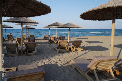 sunbeds and loungechairs on Ammoudara beach , Heraklion  photo