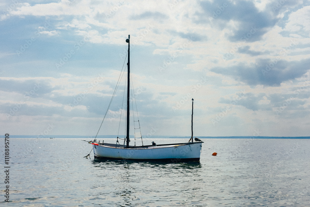 Small Ship Sailing in Sea at Sunny Day