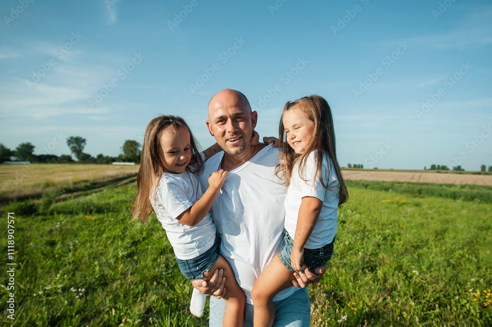 dad playing with children in lavender field. dad playing with children in lavender field.