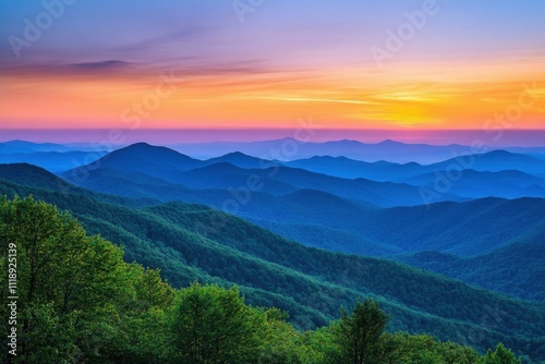 Serene mountain landscape at sunset with vibrant colors and layers.