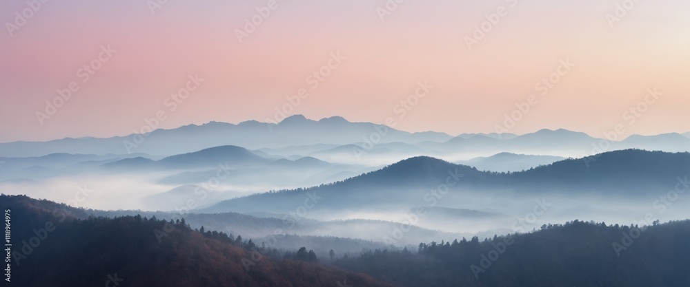 Fototapeta premium Layered Mountain Silhouettes in Morning Mist – Scenic Horizon