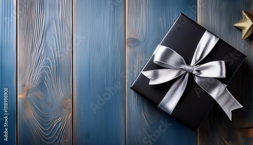 Black Gift Box with Silver Ribbon on Wooden Background. Top View of Teacher Day Gifts with Copy Space