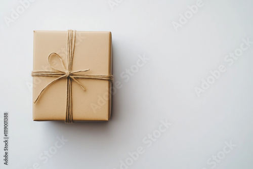 Minimalistic Image of a Closed Cardboard Box Isolated on Clean White Background photo