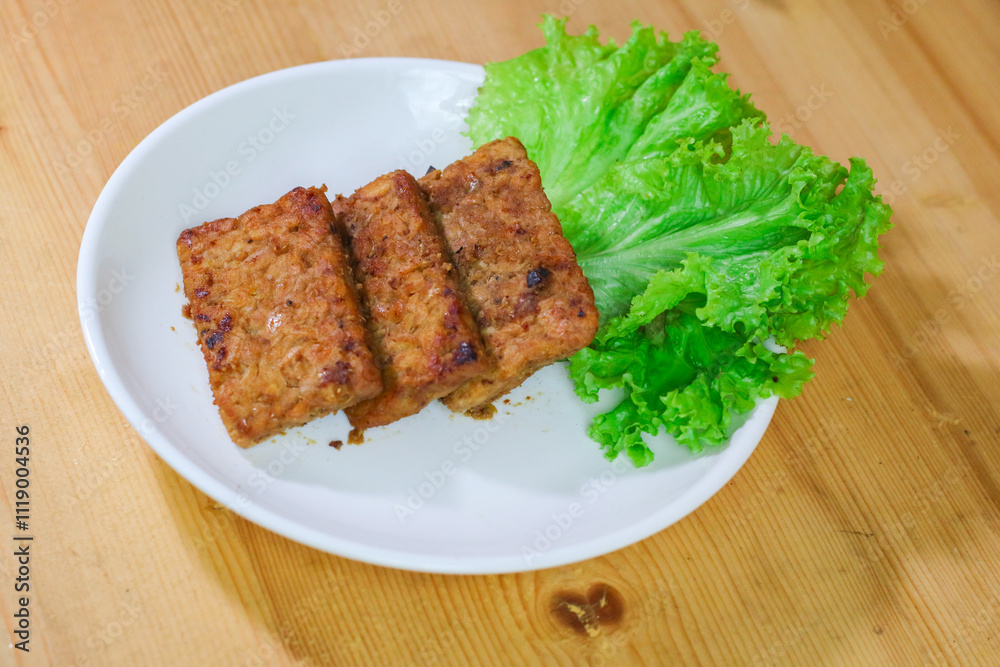 Tempe bacem is a processed tempe that comes from Central Java. Has a distinctive sweet taste because it uses palm sugar. Actually baceman is a technique of preserving food naturally.