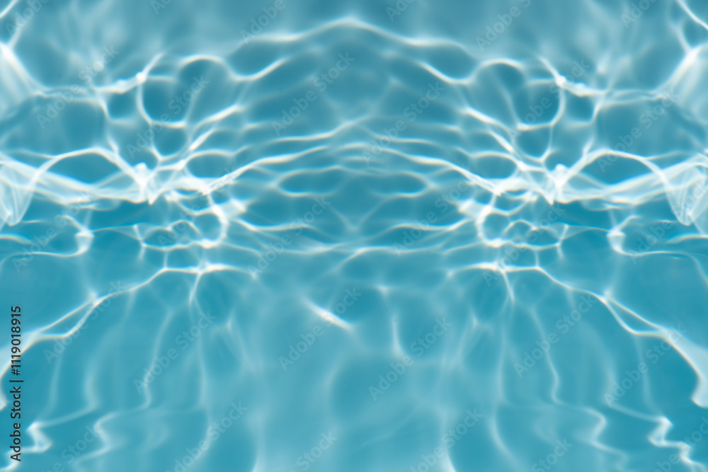 Obraz premium Blue water with ripples on the surface. Defocus blurred transparent blue colored clear calm water surface texture with splashes and bubbles. Water waves with shining pattern texture background.