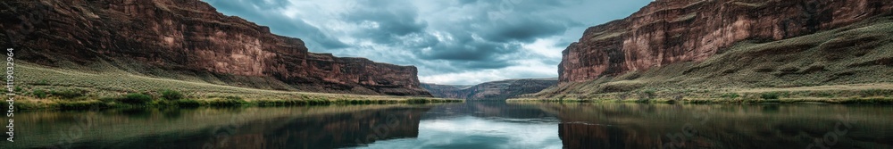 Calm River Reflecting Steep Canyon Walls Under Cloudy Skies Calm River Reflecting Steep Canyon Walls Under Cloudy Skies