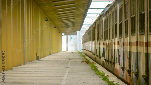 Lonely train station platform symbolizing journeys and moments of waiting