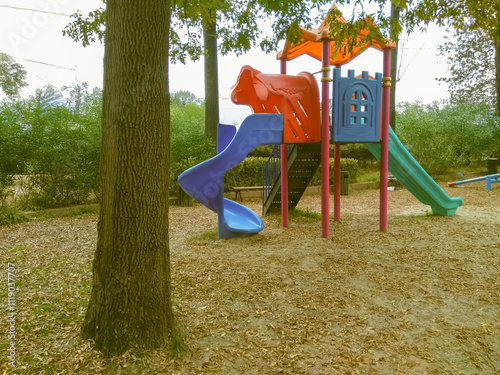 An empty playground in serene silence evokes nostalgia and quiet reflection
