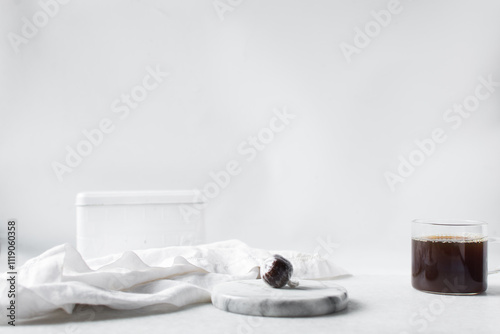 nigerian baba dudu candy on white tray, top view of Ghana coconut candy or kube toffee candy, hard candy made with coconut milk and sugar on granite countertop photo