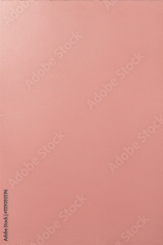 there is a pink leather surface with a small square pattern