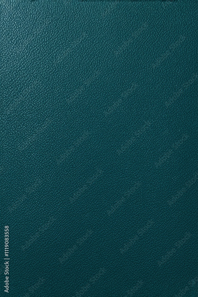 a close up of a green leather surface with a black background a close up of a green leather surface with a black background