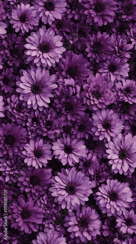 A vibrant arrangement of purple flowers creating a visually appealing floral pattern.