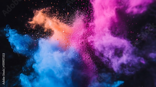 Vibrant explosion of blue, orange, and pink powder against a black background.