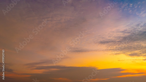 Enjoy a panoramic view of the skyline. The sun rises in the morning sky with colorful clouds. and beautiful cloud patterns In the soft light of the morning 