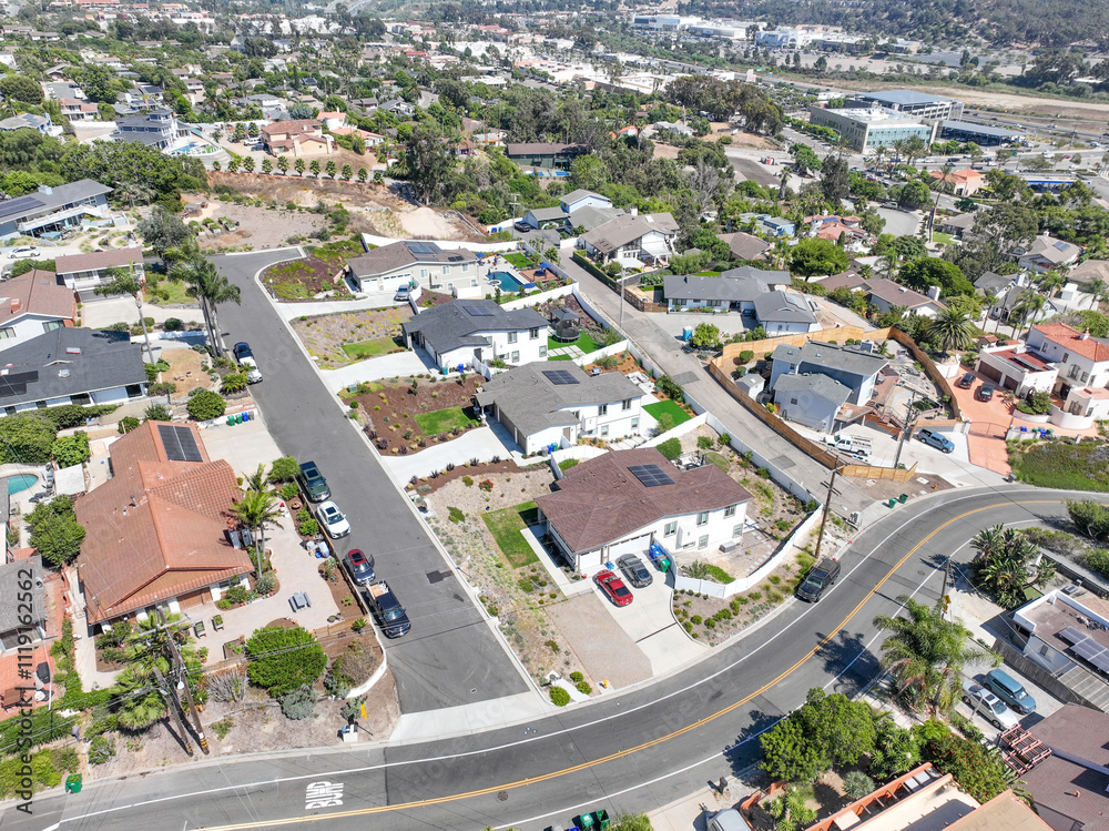 Aerial view of middle class houses in the valley of Oceanside town in San Diego, California. USA.