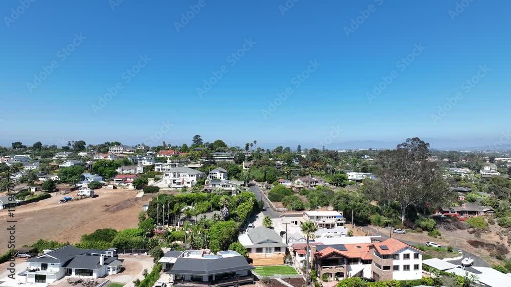 Aerial view of middle class houses in the valley of Oceanside town in San Diego, California. USA. Aerial view of middle class houses in the valley of Oceanside town in San Diego, California. USA.