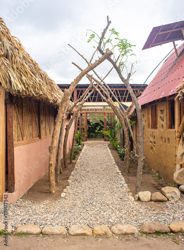 Tranquil Pathway Surrounded by Traditional Architecture in Palomino, La Guajira, Colombia photo