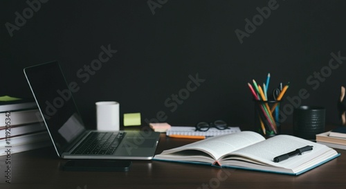 Study Desk with Open Textbooks and Laptop for Learning