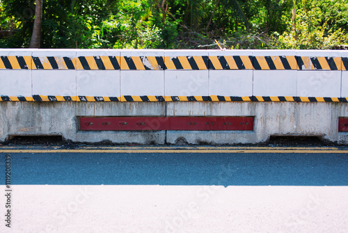 Cement bars separating the road between lanes.