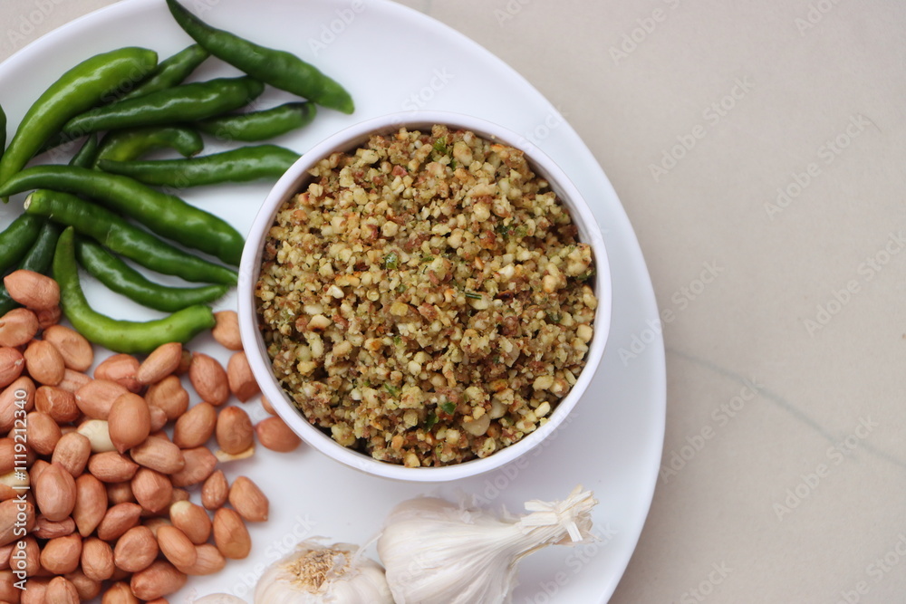 Hirvi Mirchi cha thecha, Dry green chutney made from garlic chilli peanuts which is famous in maharashtra Hirvi Mirchi cha thecha, Dry green chutney made from garlic chilli peanuts which is famous in maharashtra