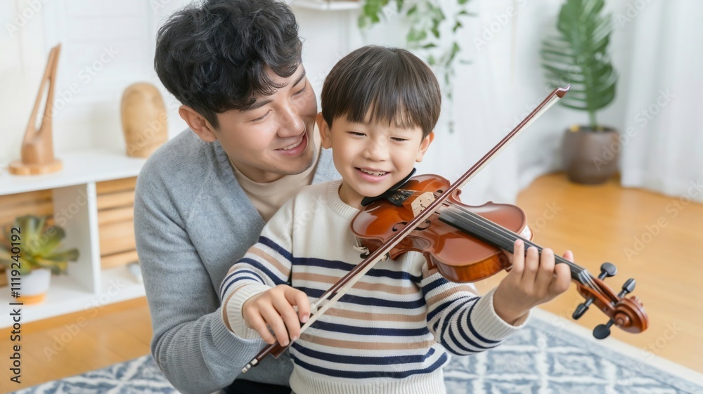 Cheerful Korean father and child learning violin together in a cozy room Cheerful Korean father and child learning violin together in a cozy room