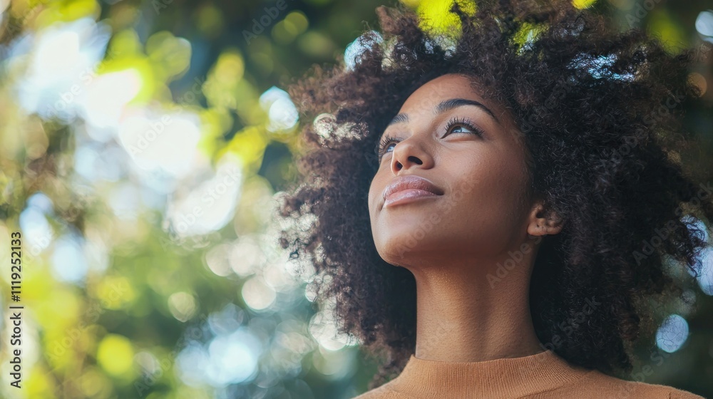 Person looking hopeful while standing or sitting in a peaceful environment